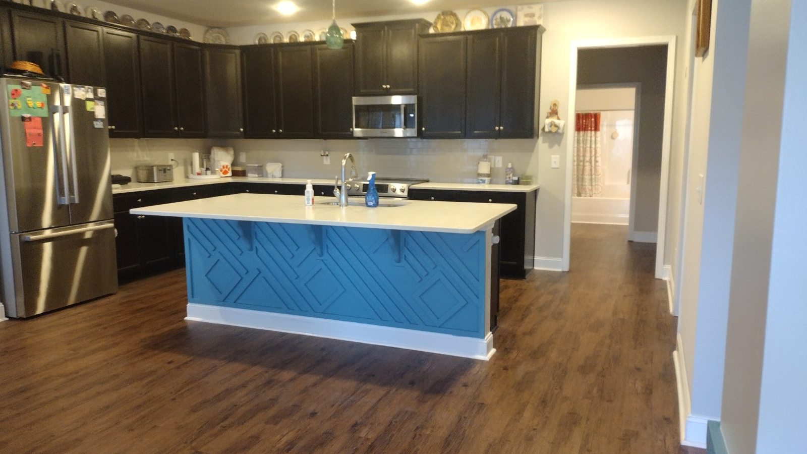 Kitchen island with custom decorative paneling