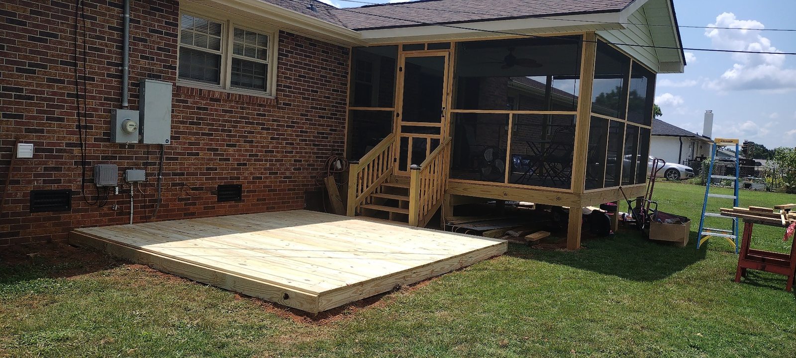 Completed exterior screened porch and deck project